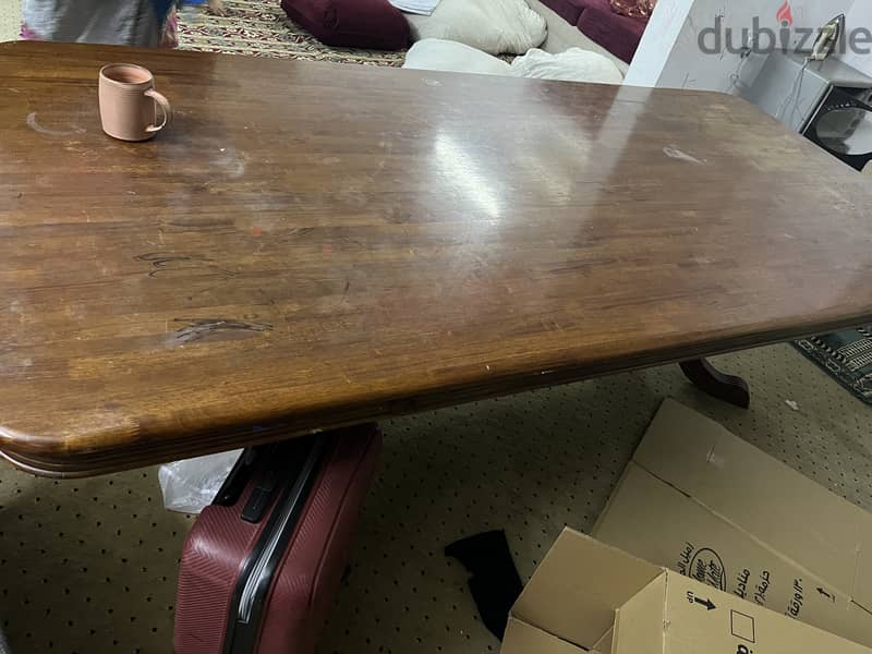 Dining table large wooden. No chairs 1