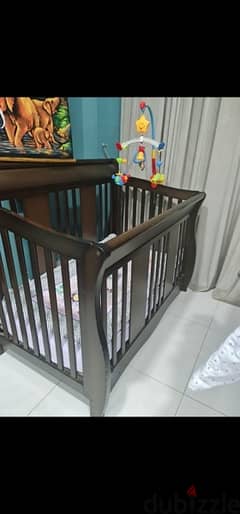 Giggle baby crib brown color