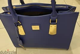 حقيبة ميلانو جديدة اشتريت ب٣٠ للبيع ب١٦ New Milano bag bought 30 now16