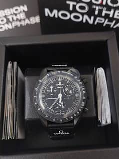 omegaxswatch moonphase black snoopy 0
