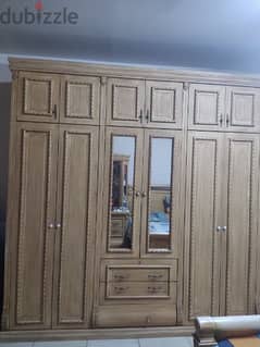 A set of Bed, wardrobe and dressing table