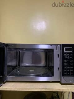 GE  microwave oven
working good condition