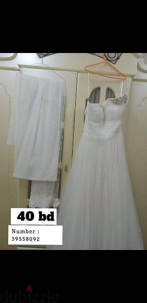 يوجد فستان زفاف شنيول مع طرحه ملبوس لبسه واحده فقط سعر ٤٠دينار قابل لت 4