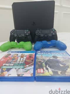 ps4 slim with two original controller and 2 games