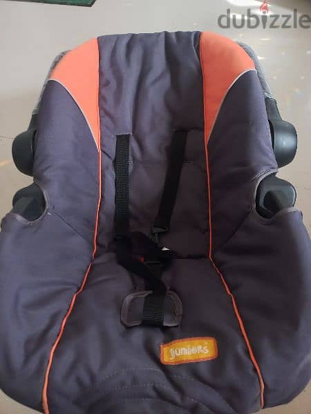 car seat and carrycot 1