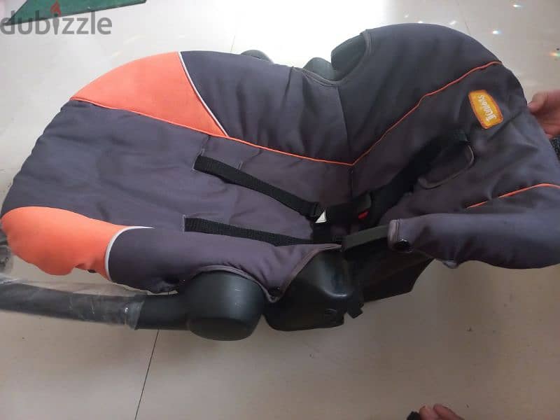 car seat and carrycot 2