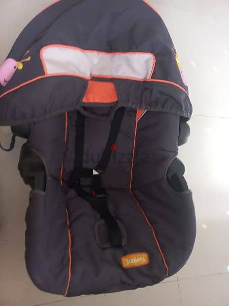 car seat and carrycot 3
