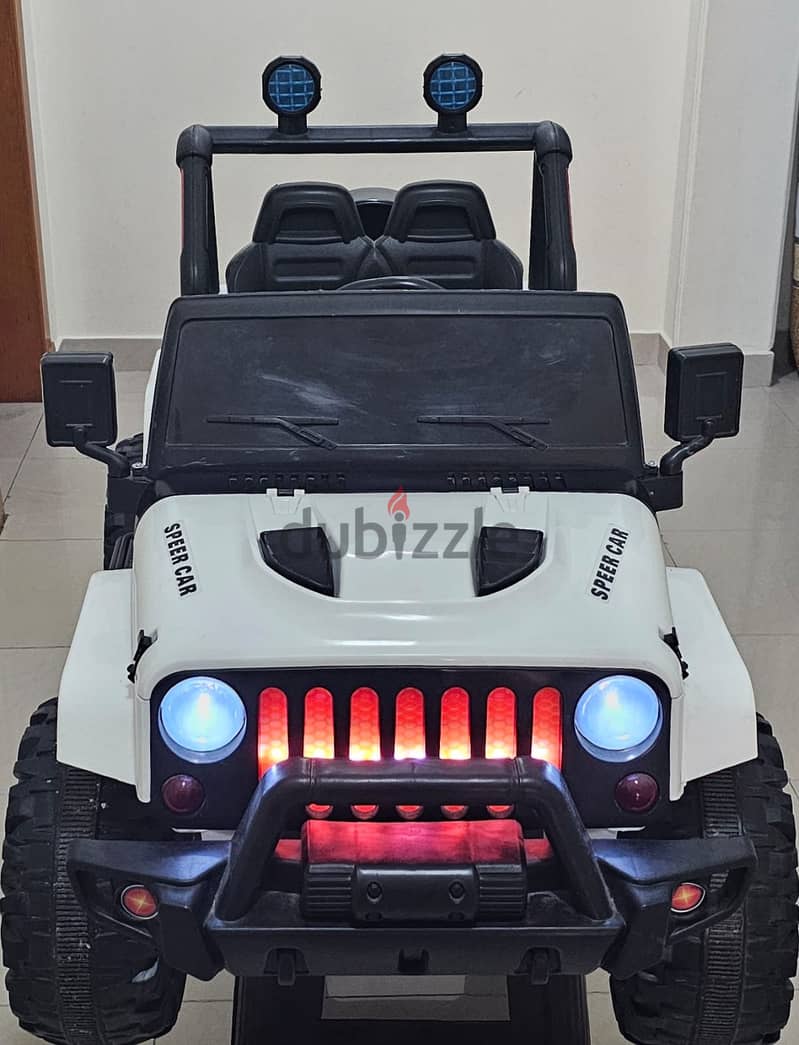 USED Rechargeable Jeep with Remote Control & MP3 Player 8