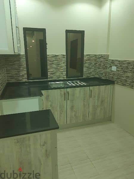 للايجار شامل  for rent haIf a full floor house with EWA in Isa Town 3