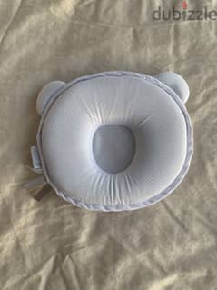 Infant pillow to prevent flat head syndrome