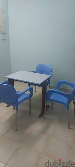 Table with 3 chairs for sale