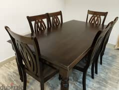 Dinig table with six chairs in a very good condition 50 BHD