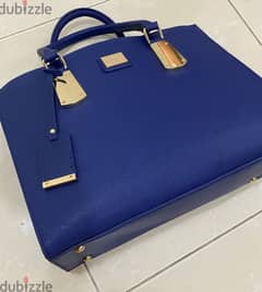 New Milano bag bought 30 now 11حقيبة ميلانو جديدة اشتريت ب30 للبيع ب