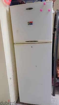 Toshiba fridge for sell cool everything is done inside outside