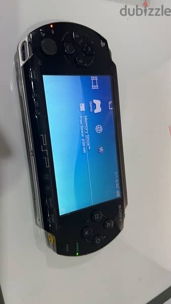 sony psp 1000 very good condition 64gb, 70 games 2