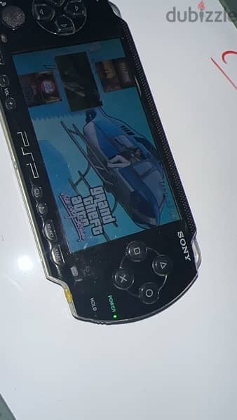 sony psp 1000 very good condition 64gb, 70 games 3