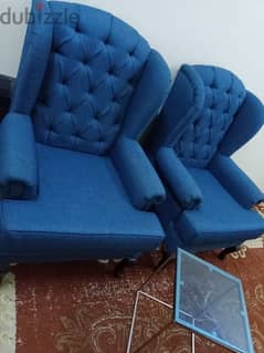 Two single sofa and table 100%percent clean and delivery free