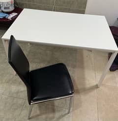 Steel framed table (125x75x75cm) with chair