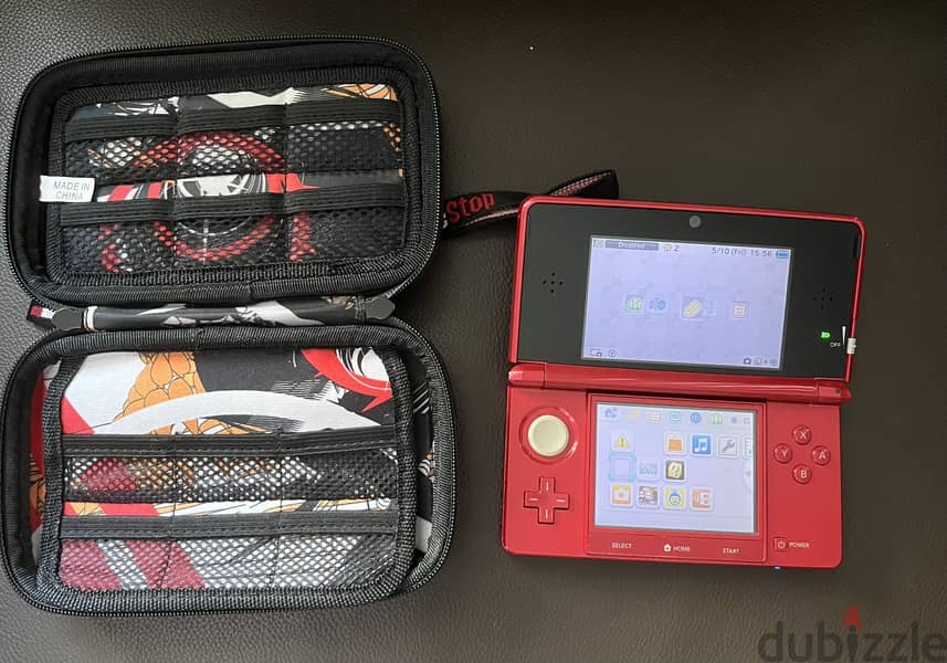 Nintendo 3DS with case and Super Smash Bros 3DS 0