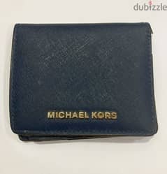 Micheal Kors Blue Wallet for sale at a negotiable price