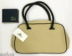 Lacoste bag and wallet for sale at a negotiable price