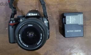 nikon dslr d3000 with 18-55 VR lens