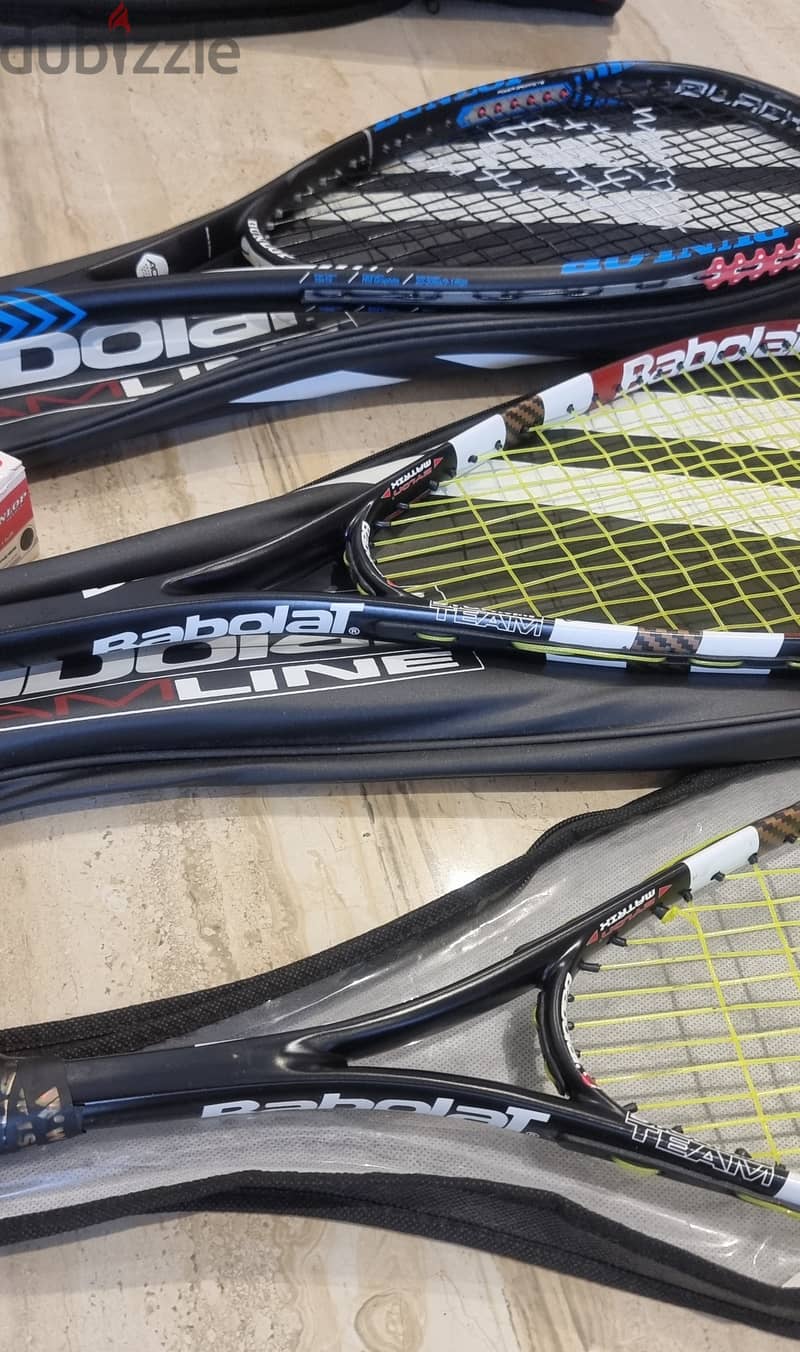 3 squash racquets, Babolat and Dunlop Carbon 1
