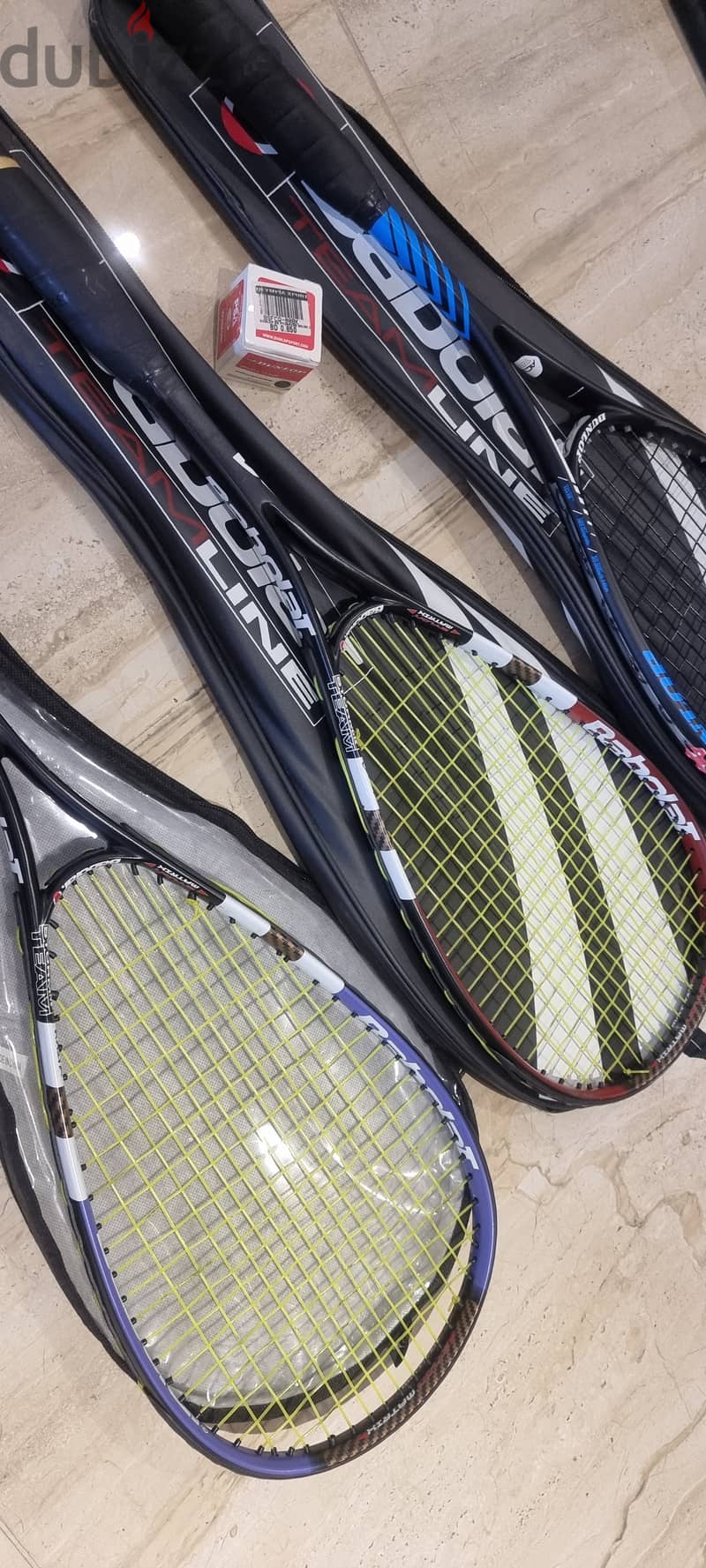 3 squash racquets, Babolat and Dunlop Carbon 2