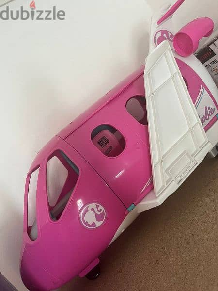 Barbie dream plane- comes with accessories. No damage. 1