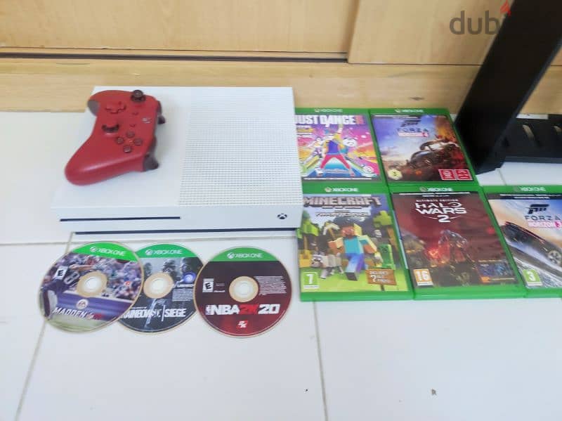 XBox One S 4k Gaming 500gb with 8 cds nd CD tower Free 2