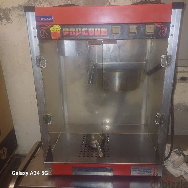 salad  cutter machine,, popcorn machine,, and trolley table 2
