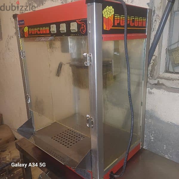 salad  cutter machine,, popcorn machine,, and trolley table 3