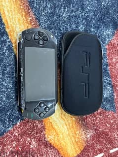 psp1000 with charge and with 100 games 0