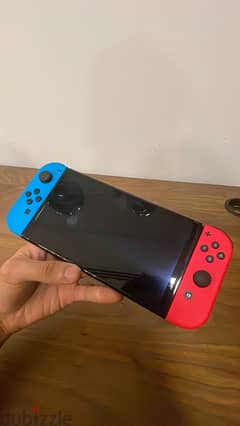 Nintendo switch used 1 month only. Includes 1 year warranty