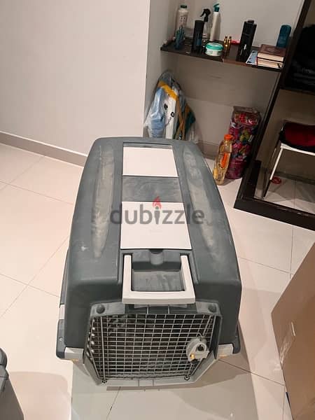 dog cage , good condition 1