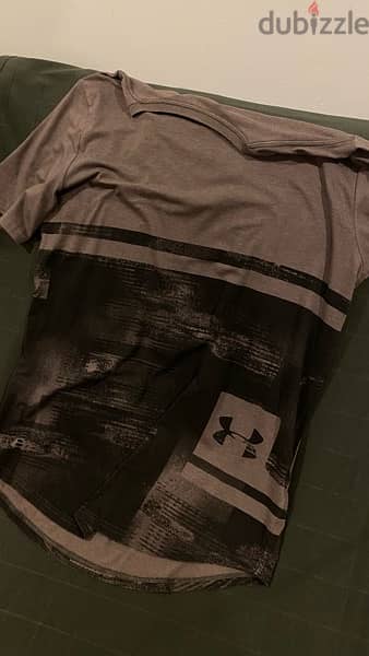 Under Armor t-shirts and polo 10