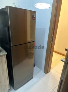 One year used sharp refrigerator with warranty