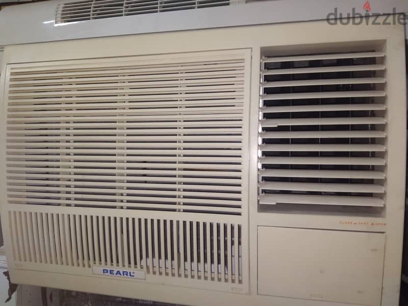 pearl a/c good condition 2