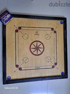 carrom board  with coins