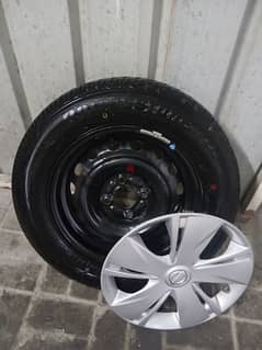 Nissan rim and tools