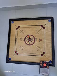 carrom board with coins