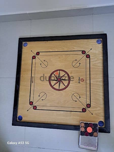 carrom board with coins 0