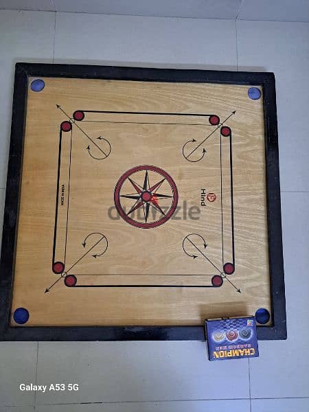 carrom board with coins 1