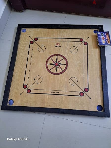 carrom board with coins 2