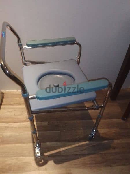 brand new moving toilet/chair 1