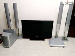 A tv of company Eurostars and speakers with a DVD