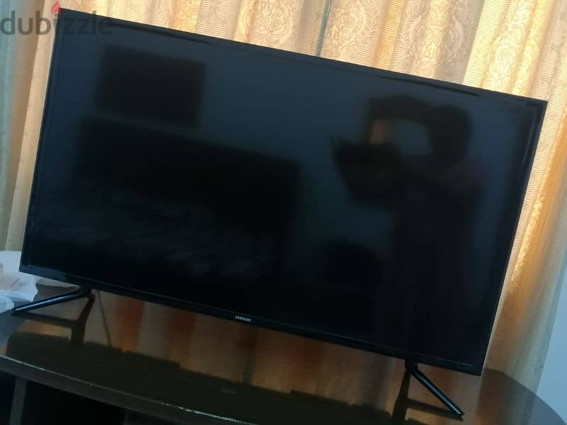 Smart T. V WITH CABINET 4