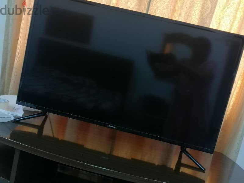 Smart T. V WITH CABINET 5