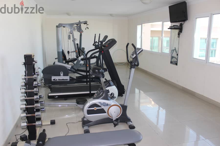 Modern 1 Bed in Adlia pool gym 8