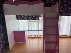 bunk bed with cabinet and mattress